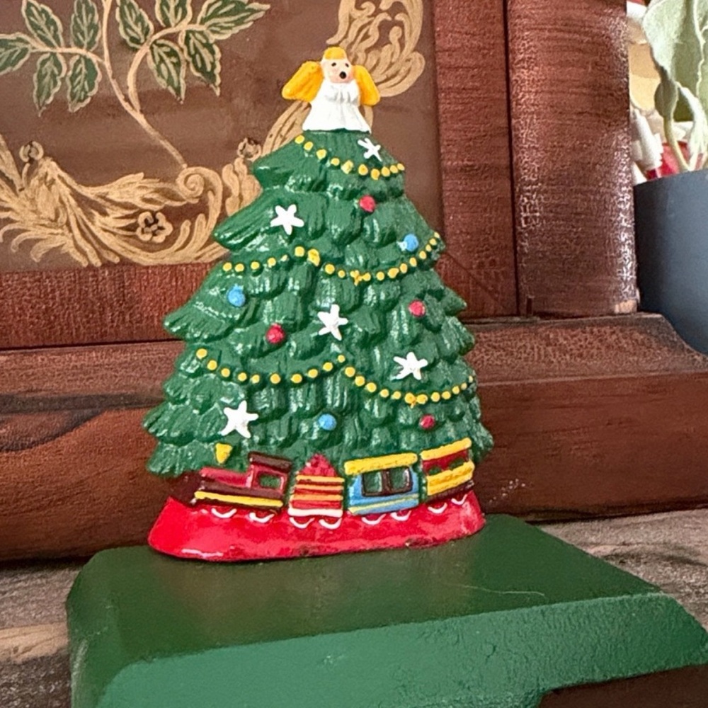 Cast iron Christmas tree stocking holder